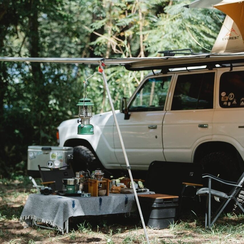 shade-attached-beside-a-white-vehicle